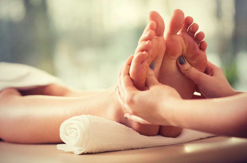 How To Relieve Back Pain By Massaging Your Feet