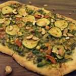 Homemade Pizza with Pesto, Zucchini and Cashew Nuts